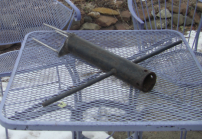 Skewer for holding cheese over
          coals