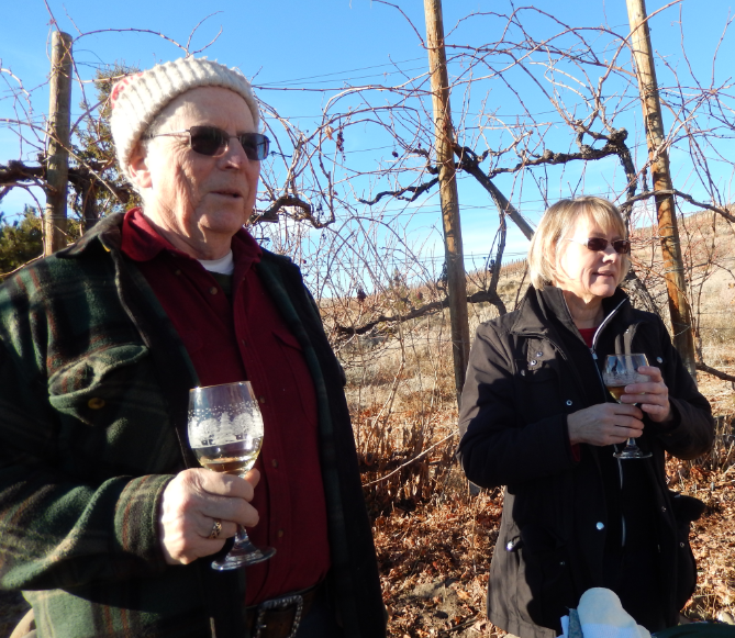 Moving along, John & Audrey
            enjoy fine wine